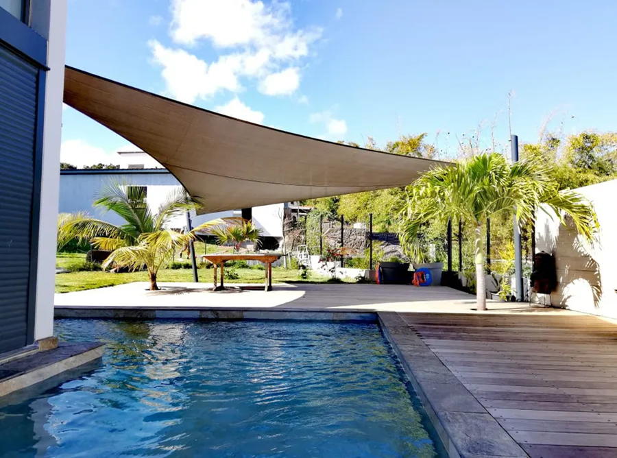 Shade sail over pool.webp width=900 height=688